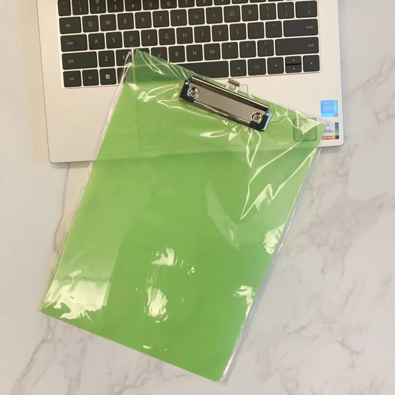 Transparent A4 plastic clipboard with metal clip in blue, green, red or white colour options