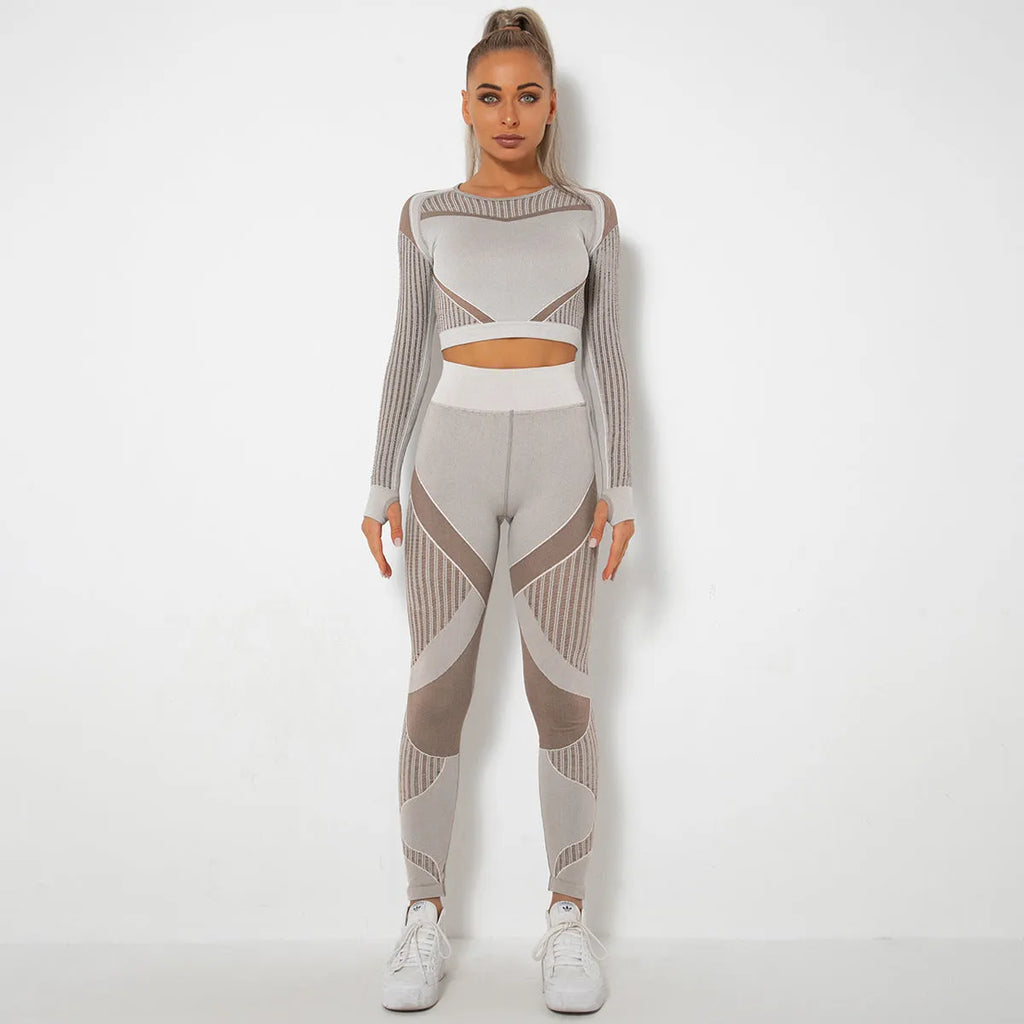 Seamless knitted long-sleeved yoga suit for women in a solid colour, showing full-length design.