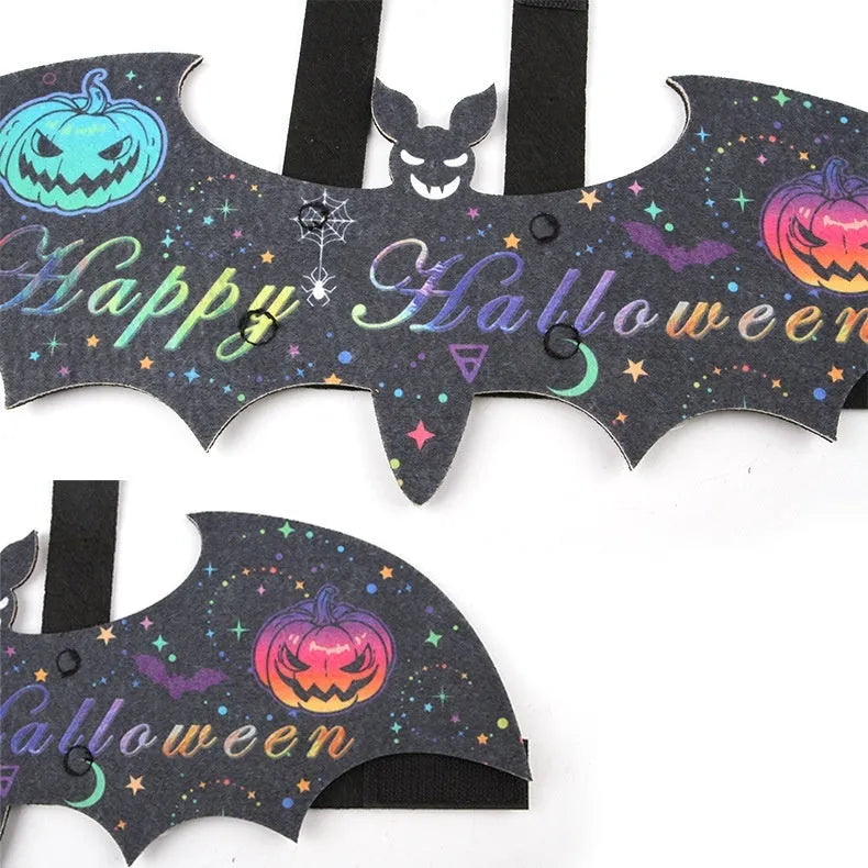 Felt black batwing Halloween costume being worn by a cat
