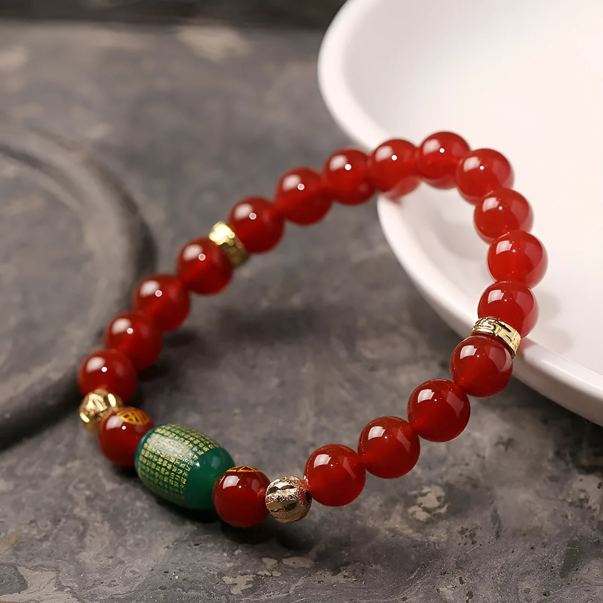A new Chinese style agate Guanyin bracelet rosary with auspicious patterns, shown in green and red colour options.