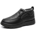 Men's black fleece-lined waterproof winter slippers with a non-slip rubber sole.