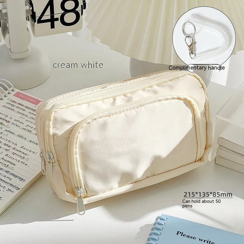 Double layer pencil case in mint green with gift handle showing dimensions 215 x 135 x 85mm