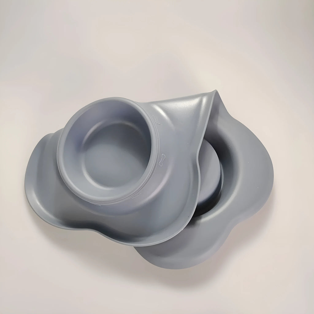 Large silicone dog bowl with stainless steel insert in blue, showing double-bowl design.