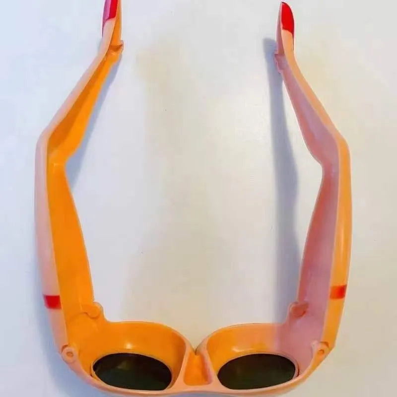 Orange personality sunglasses with distinctive leg hip design, measuring 15 by 20 centimetres