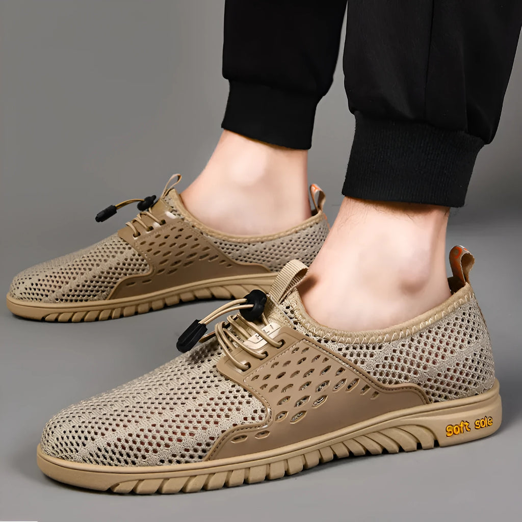 Men's casual shoes with mesh upper and elastic band in black, grey, or sand colour