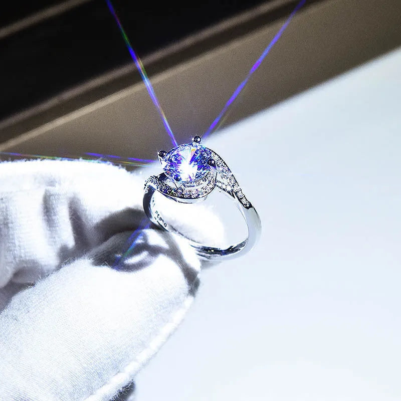 Silver geometric synthetic moissanite ring with adjustable opening showing 8mm stone