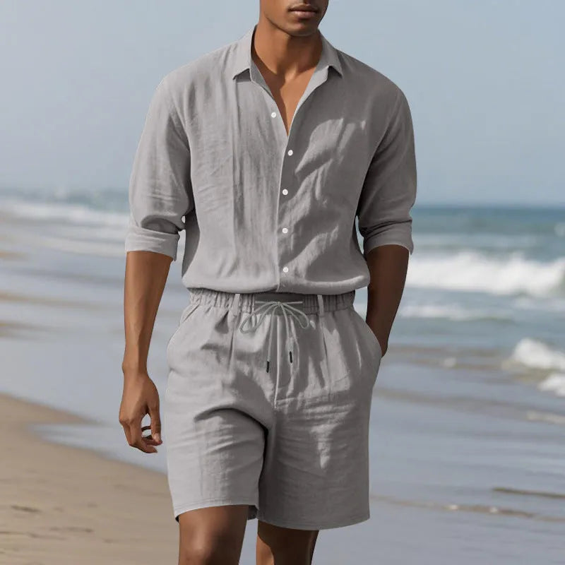 Men's linen long-sleeve shirt and shorts beach suit set on a hanger.
