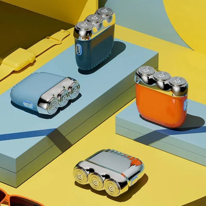 Three-head mini electric shaver in gun metal, orange, green, or blue colours