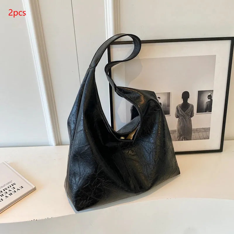 Soft leather large capacity shoulder bag in street trend style with sewing thread detailing