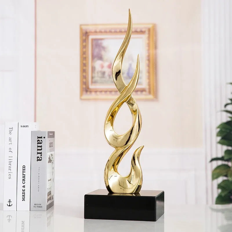 Modern resin festival decoration ornament in bright gold colour with handmade craftsmanship details