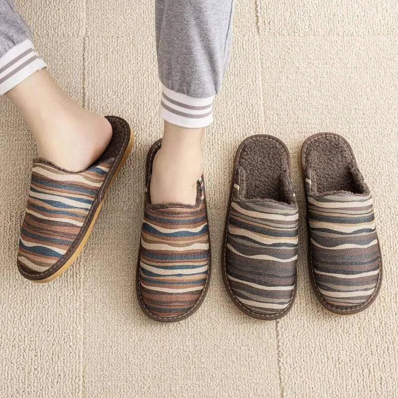 A pair of cotton household slippers with a linen surface and PVC sole in one of six colour options.