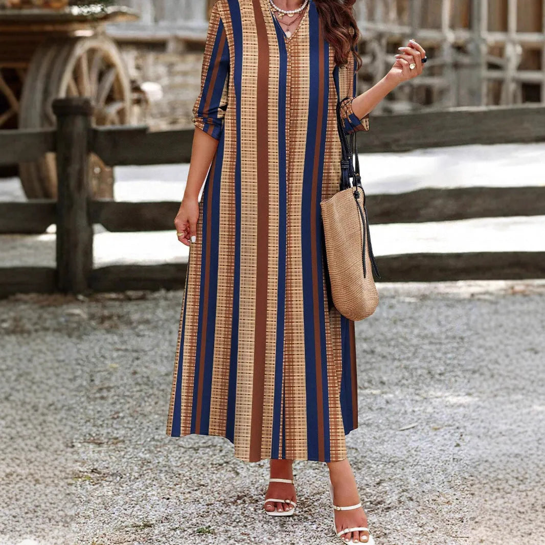Camel coloured vertical striped V-neck knitted long dress with A-line silhouette on hanger