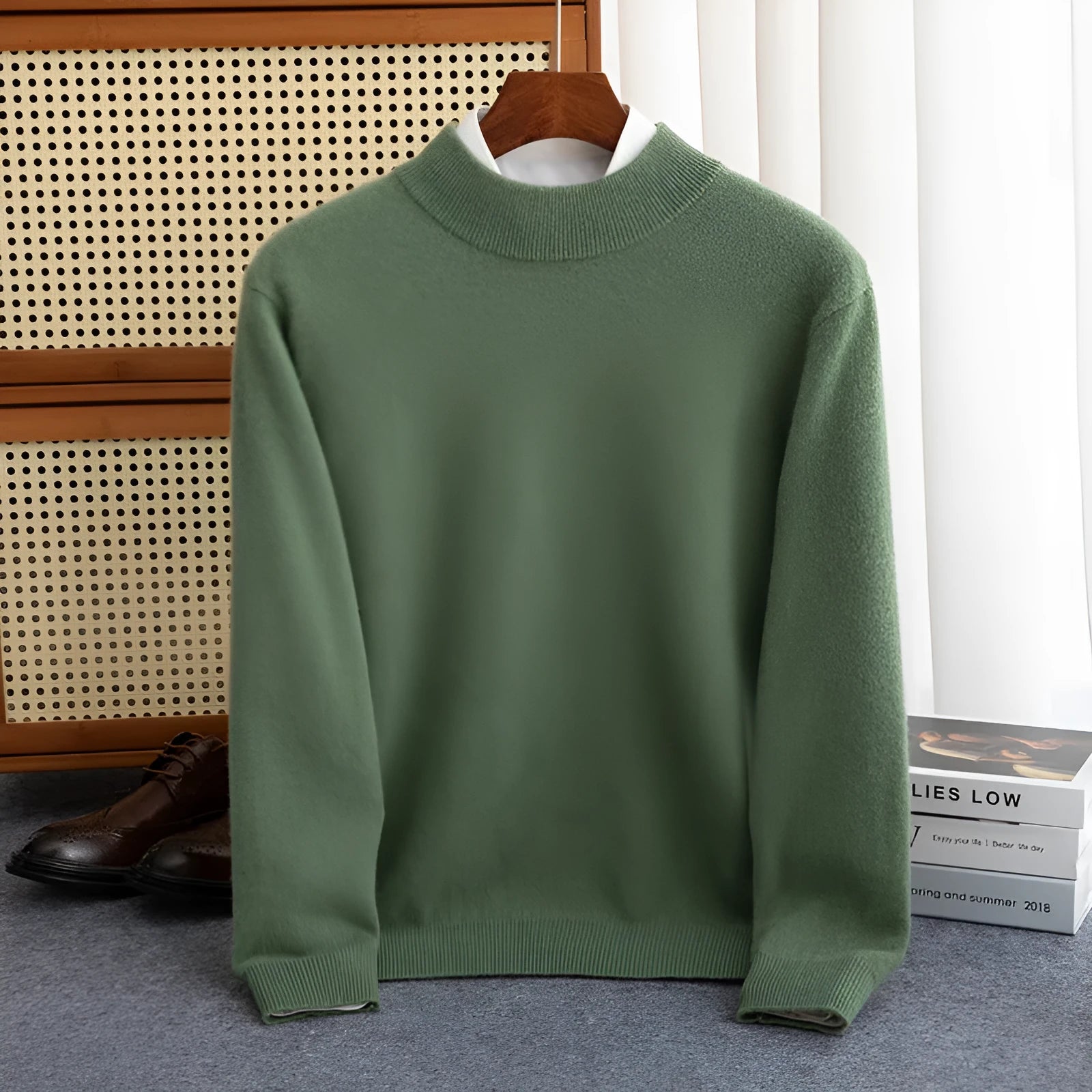 Men's chunky knit half-turtleneck wool sweater in camel colour with cable stitch detail.