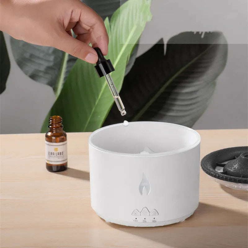 Volcano humidifier with two-colour flame effect spray ring and round plastic housing