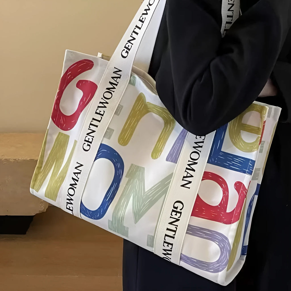 Large capacity canvas tote bag with printed letter design for women's travel and shopping