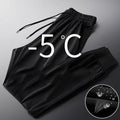 Men's Korean fashion loose striped sweatpants in black with belt and straight leg