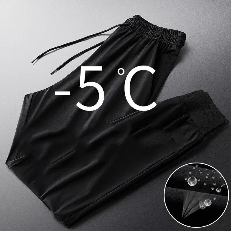 Men's Korean fashion loose striped sweatpants in black with belt and straight leg