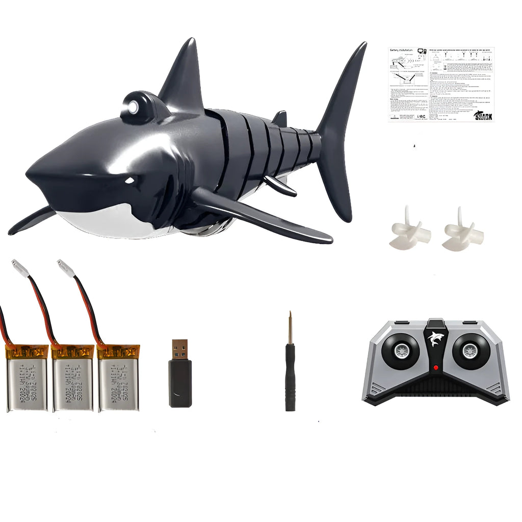 Remote control shark boat water toy for children with handle controller, plastic body, colour box, and USB power option.