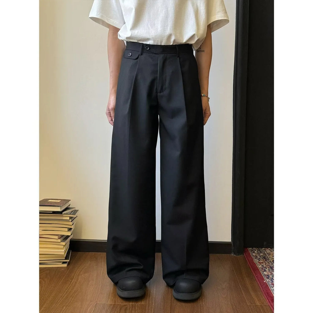 Men's brown straight-leg wide drape casual trousers laid flat