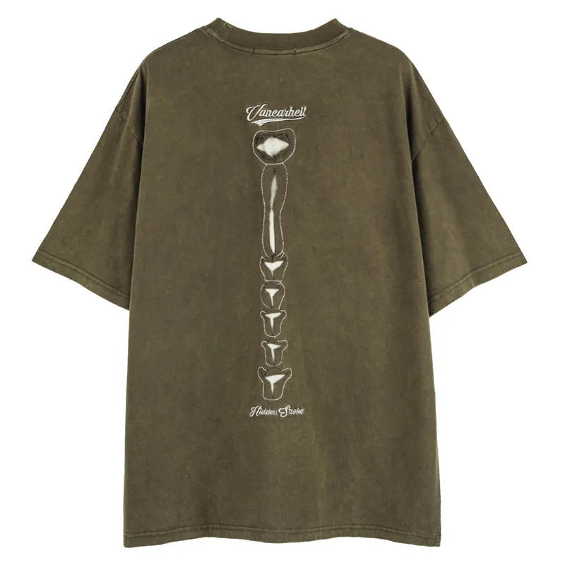 Black cotton T-shirt with a large white skull and letter graphic print, showing loose fit and drop-shoulder sleeves.