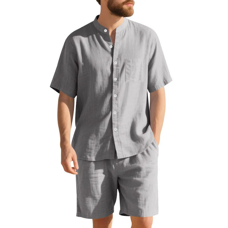 Men's light blue linen blend summer suit with short sleeve shirt jacket and matching shorts on a hanger.