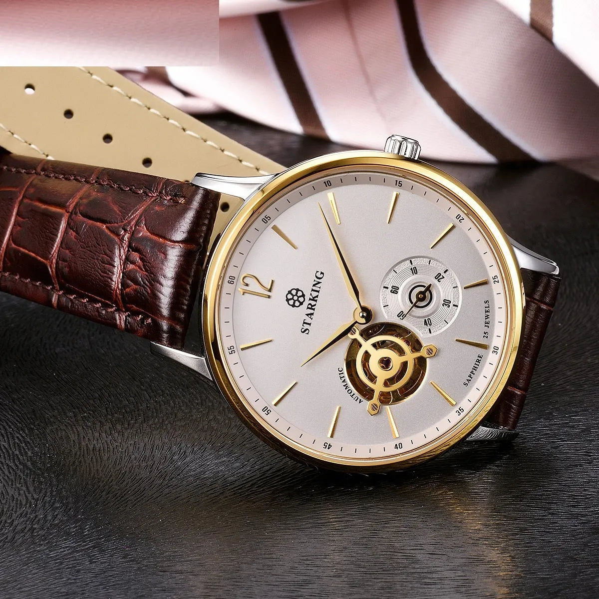 Men's automatic mechanical business watch with hollow dial showing three hands, stainless steel case, and brown leather strap