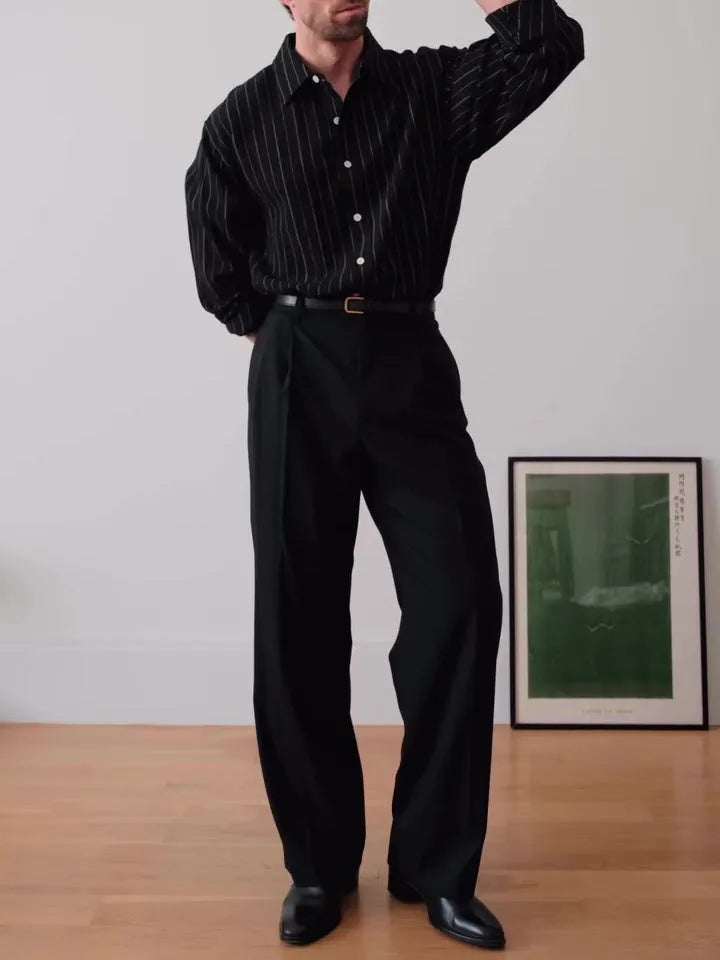 Black pinstriped button-down shirt with regular fit and traditional collar on mannequin
