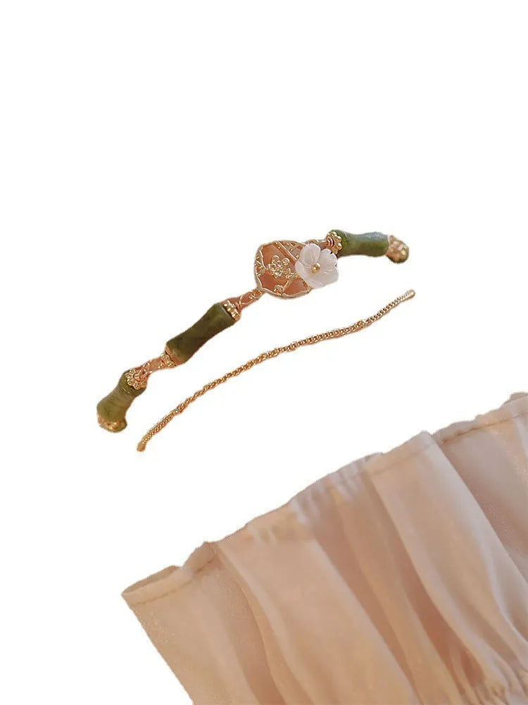 Natural olivine double layer bracelet with twin Bells of Ireland charms and olive branch design elements