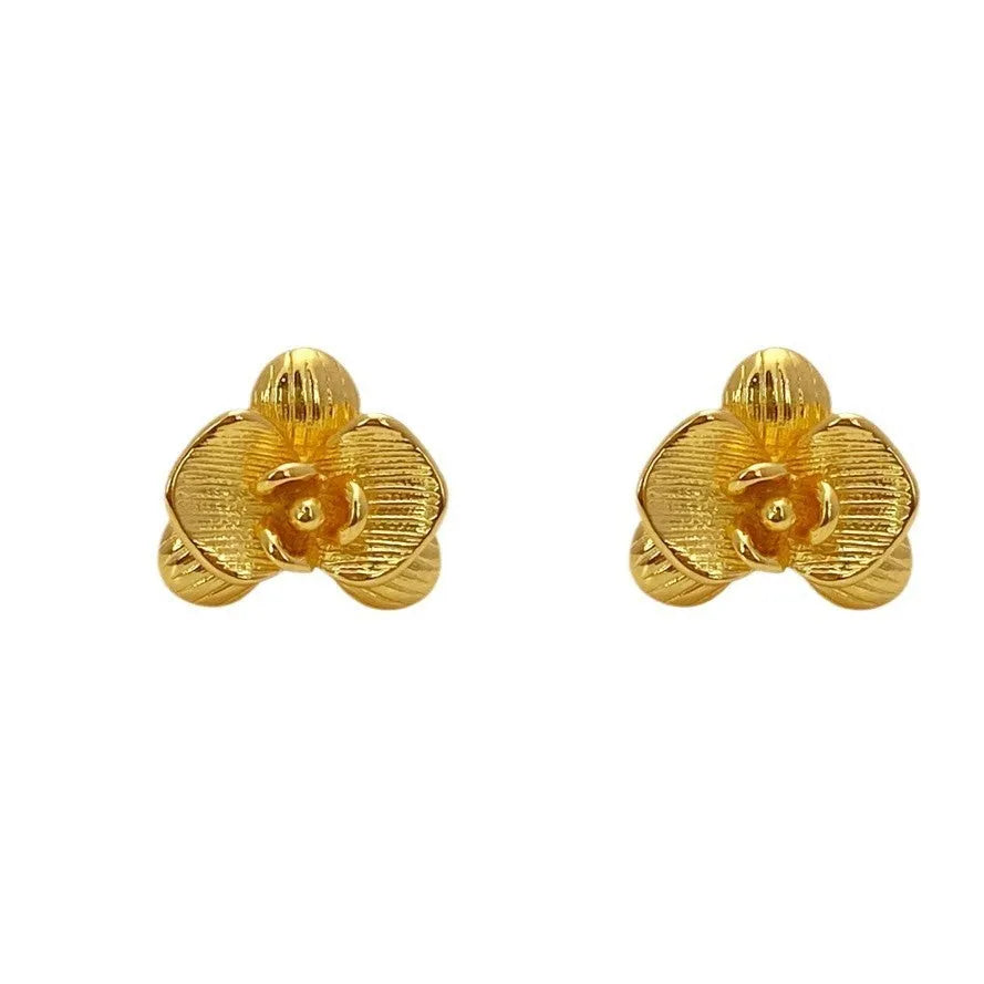 Women's retro floral copper earrings with electroplated gold or silver finish showing petal flower design