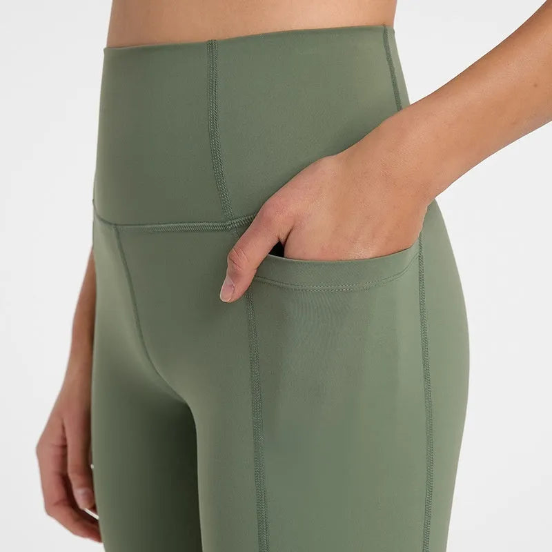 Woman wearing solid colour super stretch cotton blend sports shorts for running.