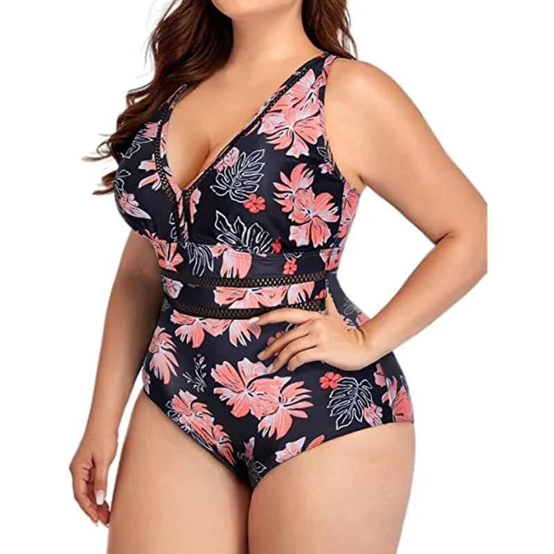 Black plus size women's swimsuit with all-over print pattern and mesh fabric stitching details
