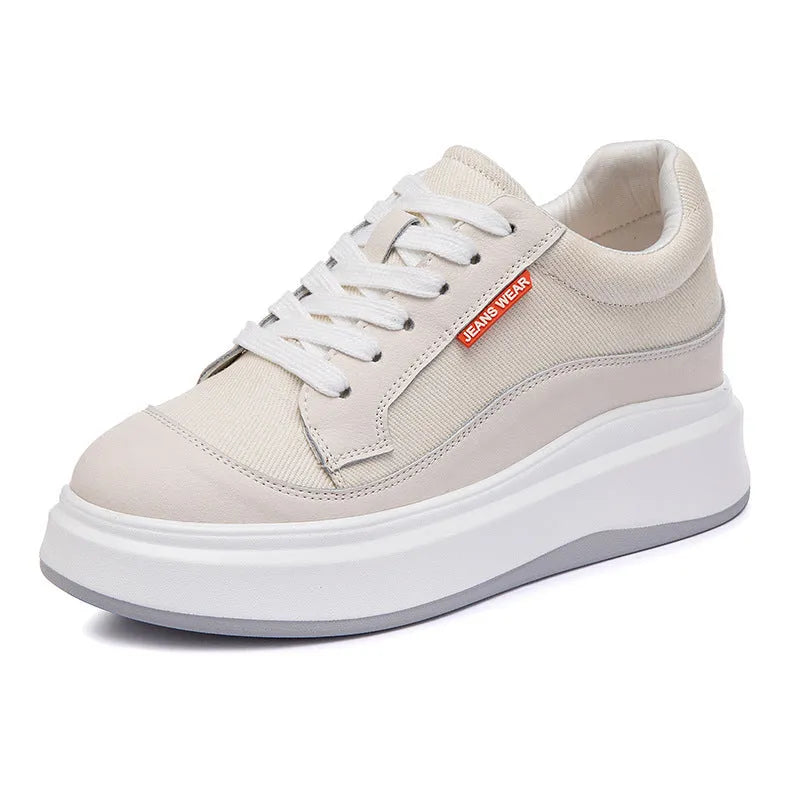 Women's beige leather casual shoes with thick flat soles showing side profile