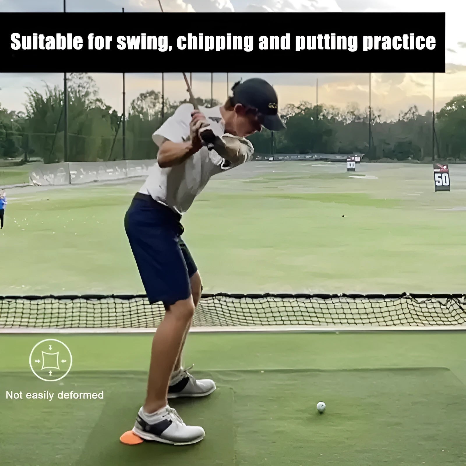 Orange golf training mat with centre of gravity design on natural rubber surface