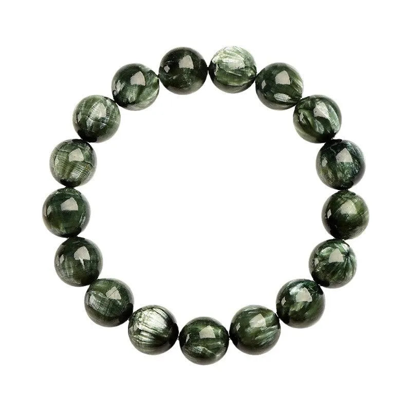 Green Dragon Crystal bracelet with round beads and a central Ruyi knot on a wrist.