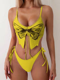 Purple women's bikini suit with a bow on the top and split-style briefs.