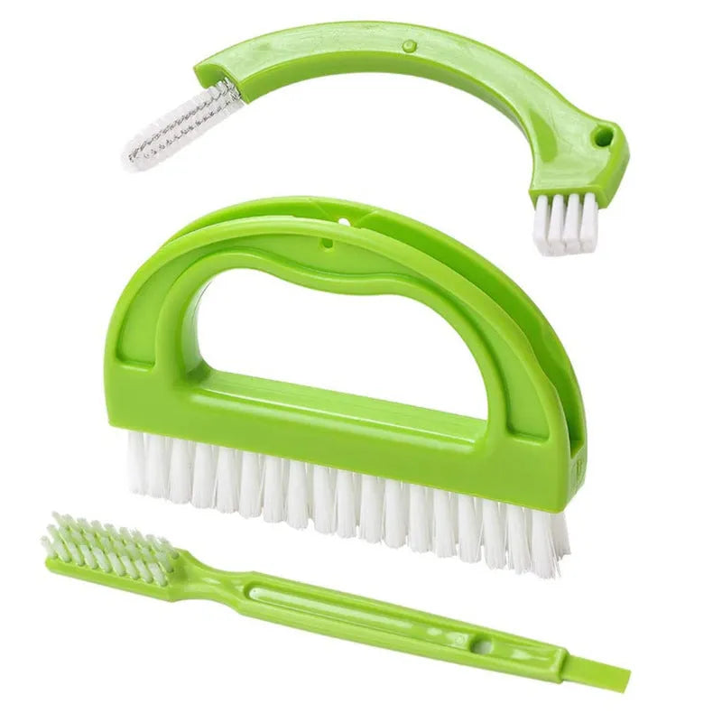 Green plastic floor seam cleaning brush set three pieces on a tiled floor