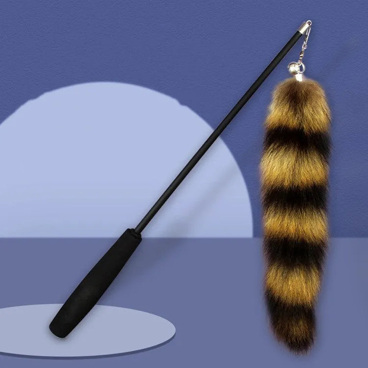 Black cat toy wand with feather attachment and long elastic string for interactive play