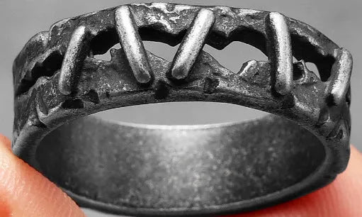 Stainless steel dark punk stitching style double ring on a hand, showing the layered design.