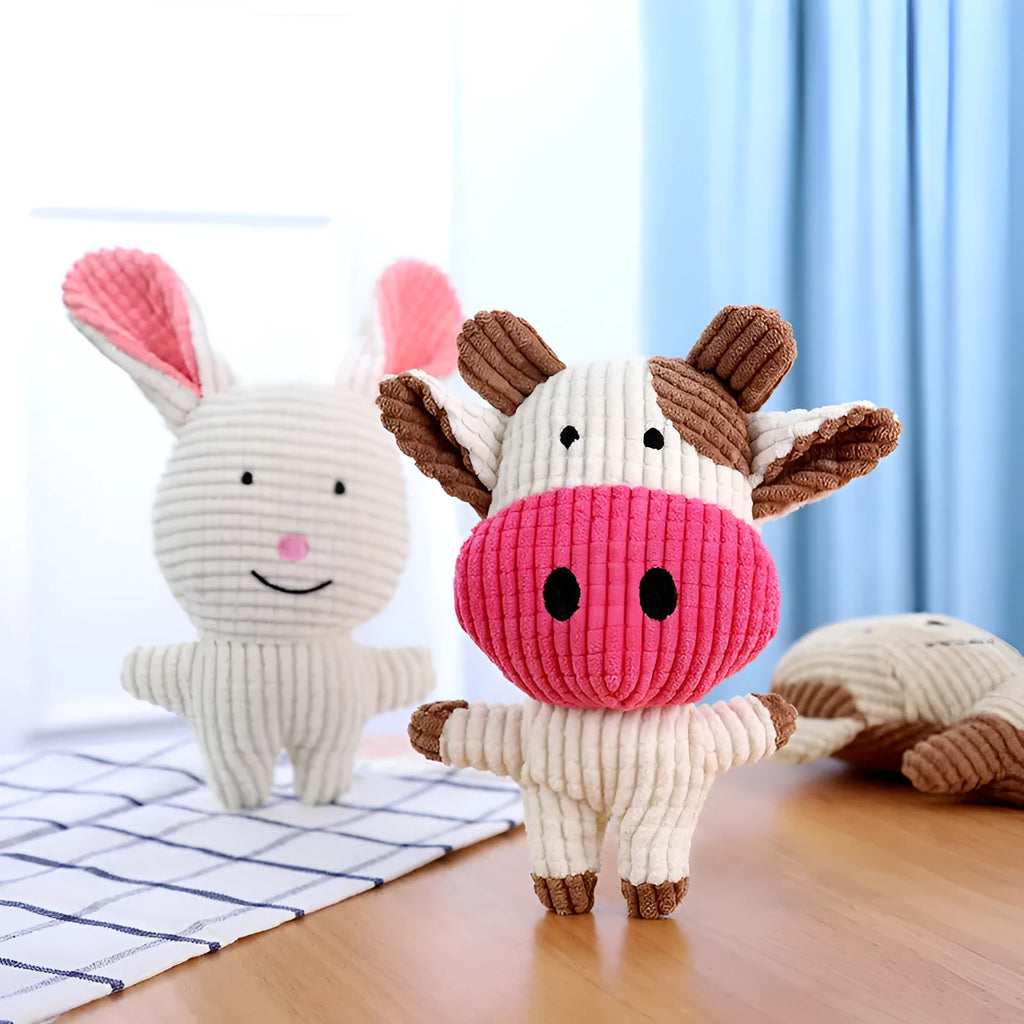 Animal-shaped plush dog chew toys with squeakers in blue, brown, grey, pink, white, and yellow colours