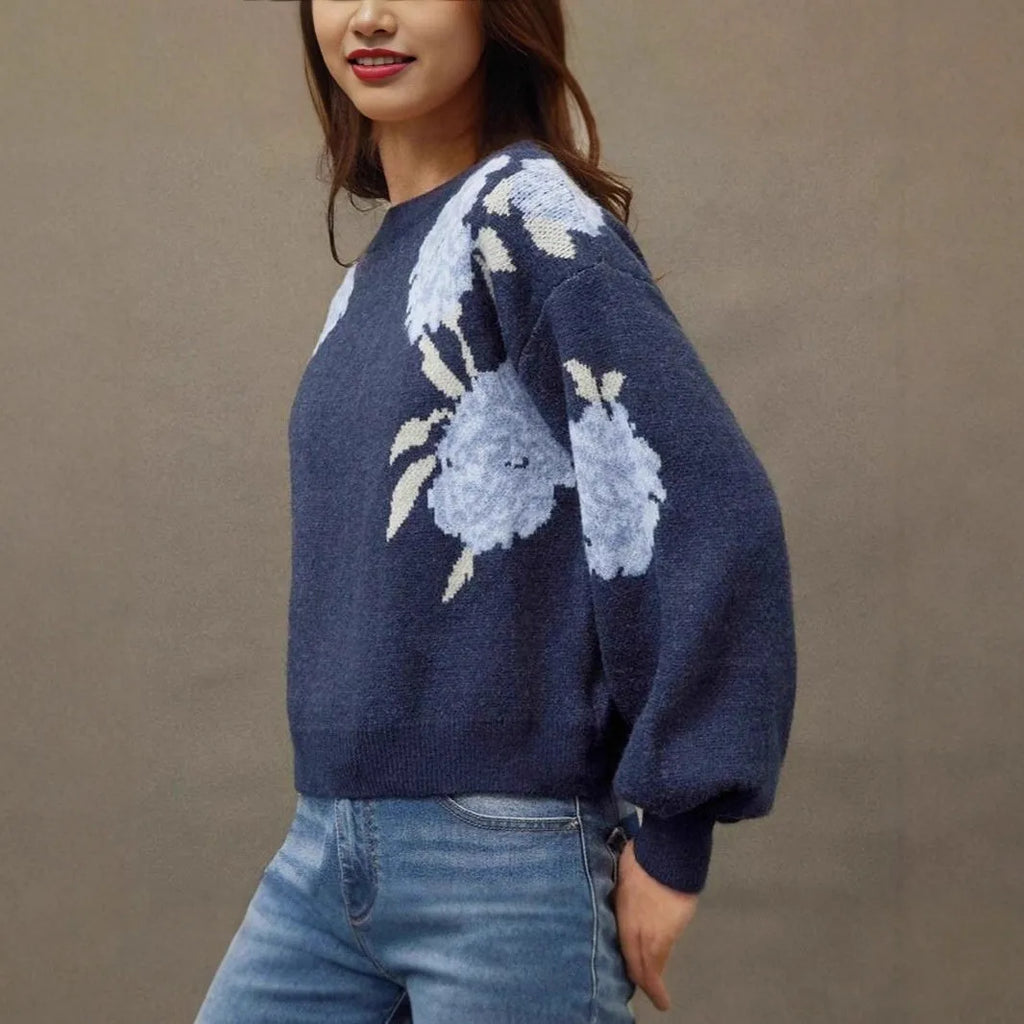 Sapphire blue women's loose pullover with woven floral jacquard pattern and off-neck design.