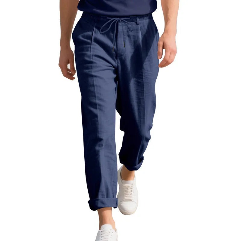 Men's straight-leg linen casual trousers in light khaki colour with a drawstring waist.