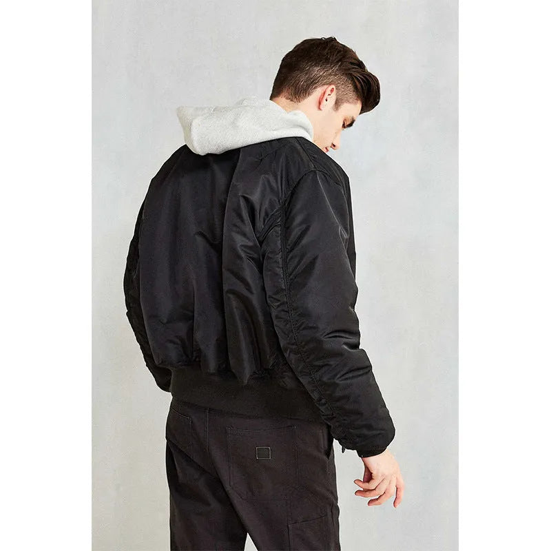 Men's army green cotton-padded pilot jacket with a loose fit and zipper front.
