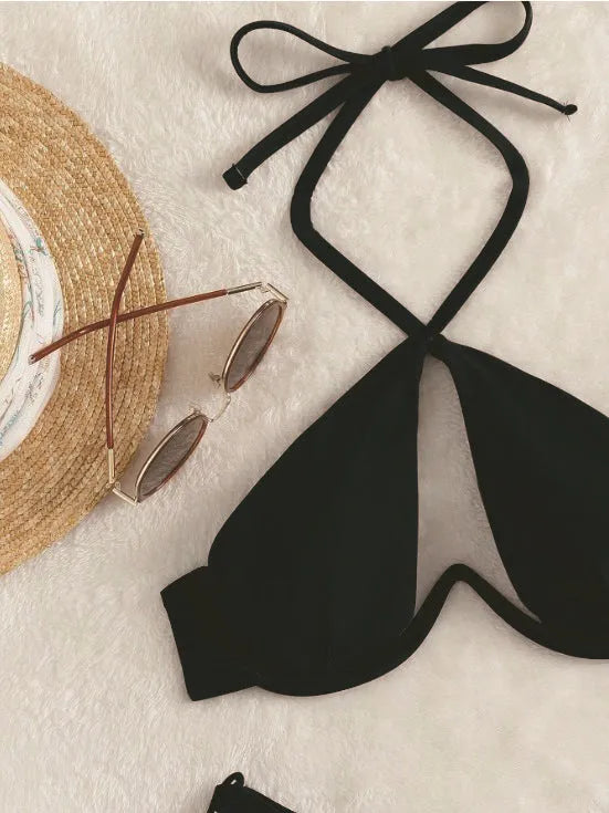 Women's solid colour halter bikini with backless briefs in black, blue, or brown