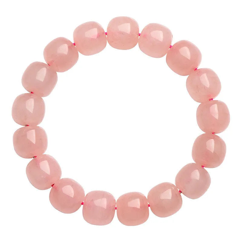 Natural crystal barrel shaped bead bracelet with pink polished geometric beads