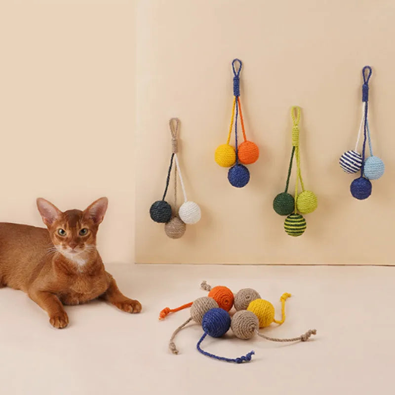 Cat toy set with teaser stick and assorted catnip balls in blue, green, red, yellow colours.