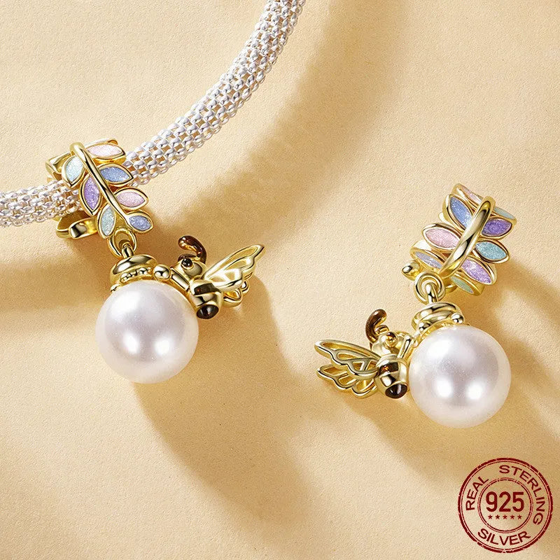 S925 sterling silver gold plated bee pendant with pearl accent, 2.1cm high, 1.4cm wide, 0.45cm aperture