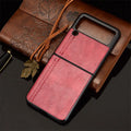 Cow pattern car thread PC leather phone case for Samsung Galaxy Z Flip 3 and Z Flip 4 in black, blue, wine red or yellow.