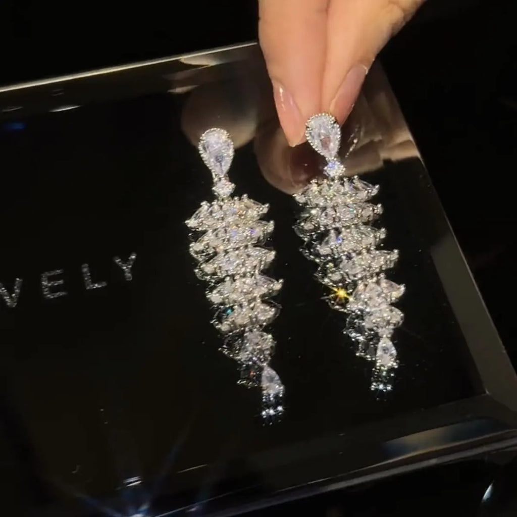 Silver pagoda Christmas tree drop earrings with sparkling zircon stones on copper stud fittings
