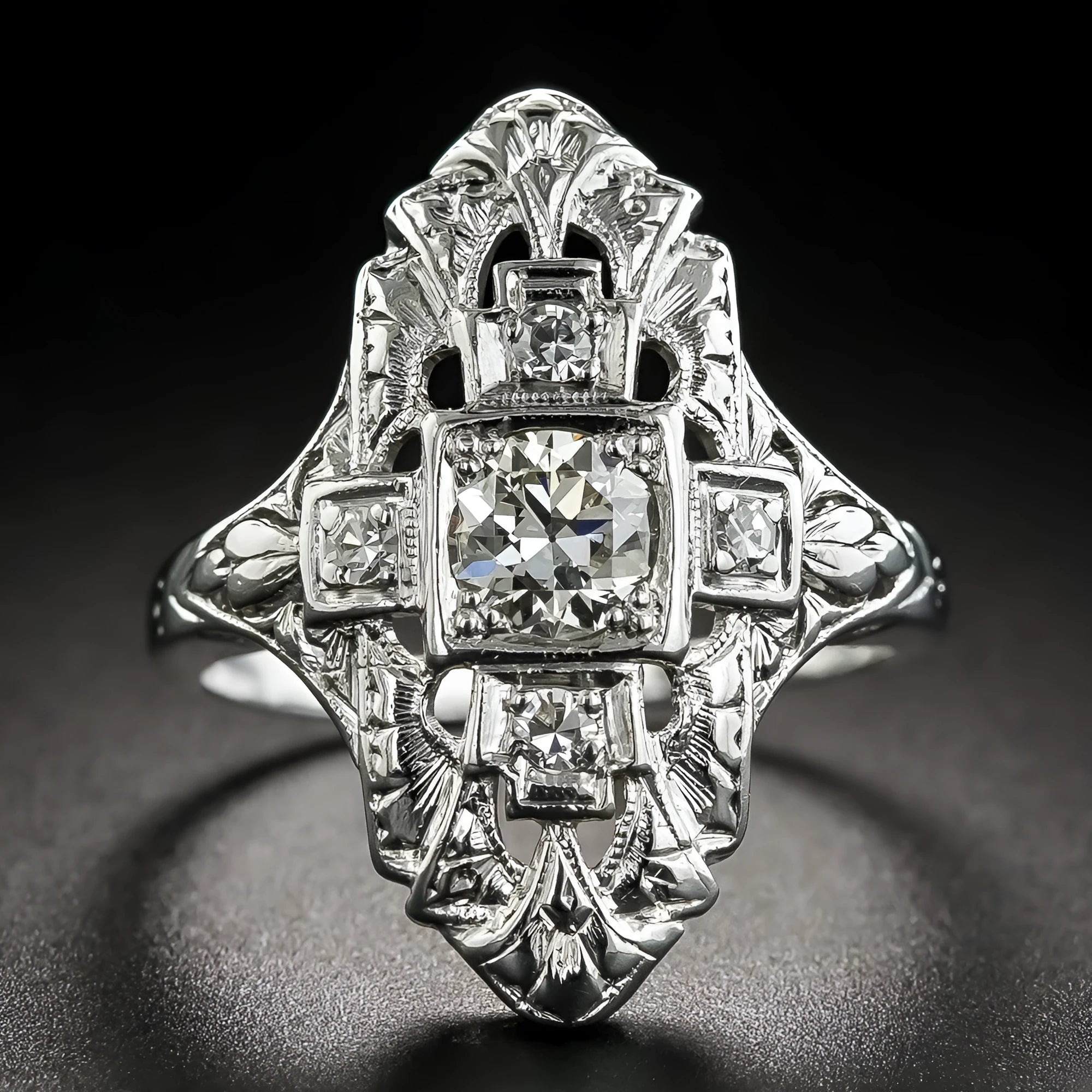 Geometric hollow out silver ring with diamond stud accents on copper base