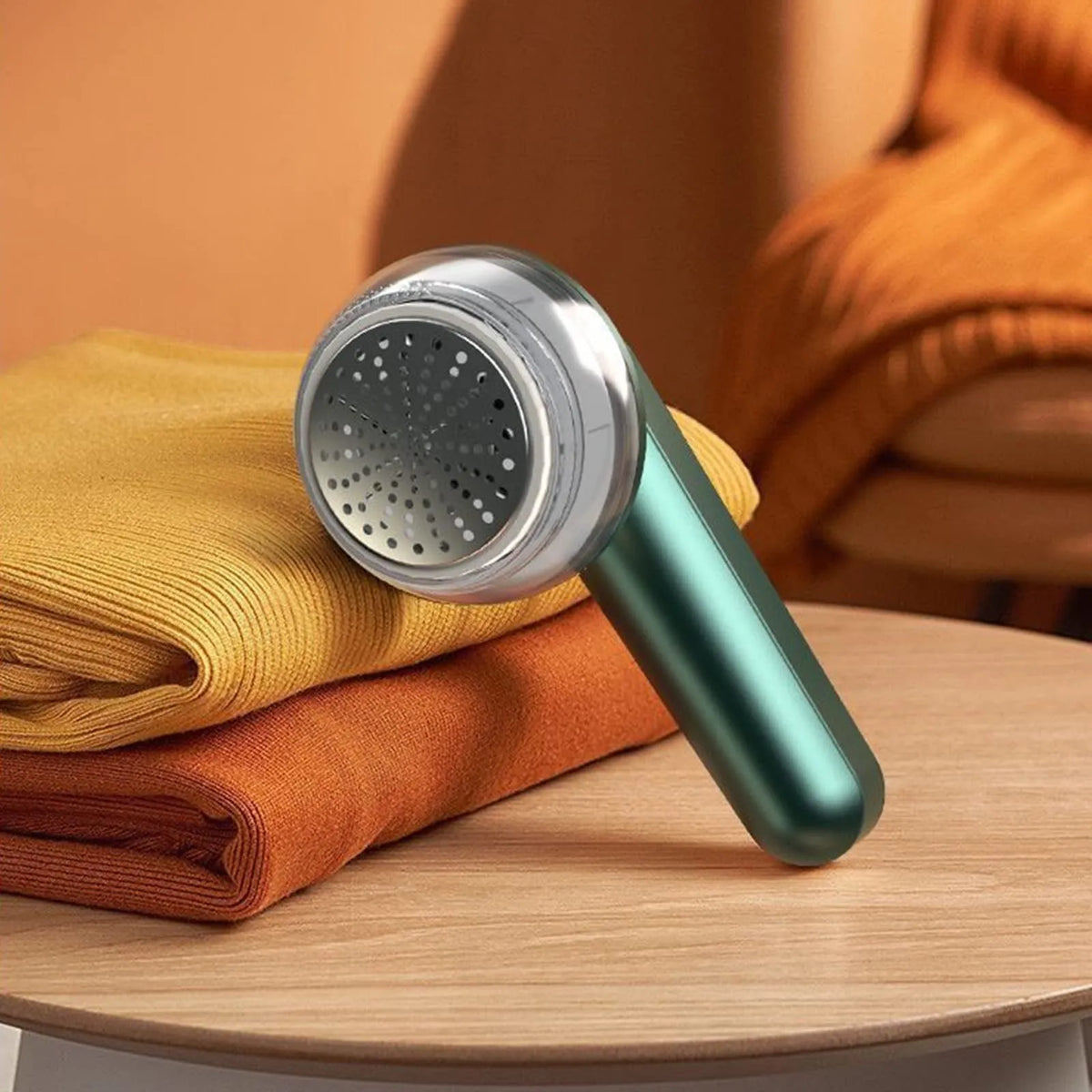 USB rechargeable electric lint remover in white or green with six-leaf stainless steel blade and lint collector container